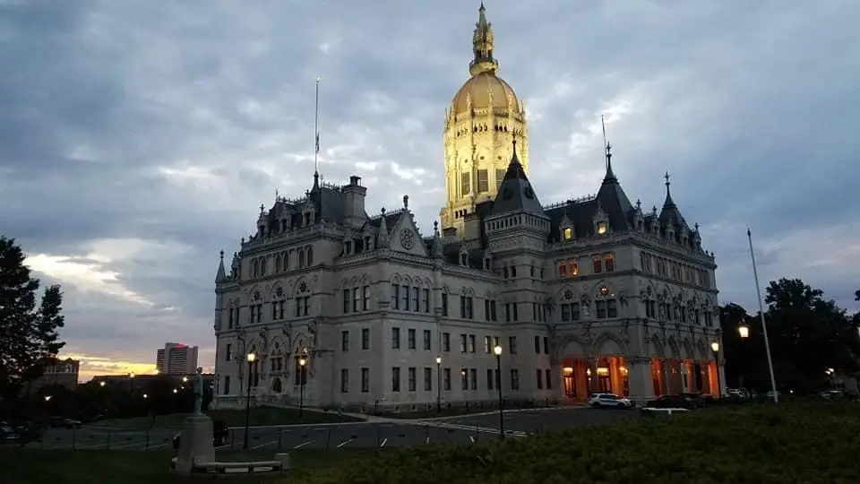 The Connecticut State Capitol illuminated at dusk in Hartford